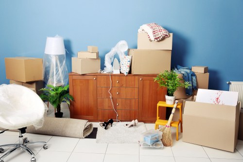 Unpacking boxes and arranging belongings in a new property