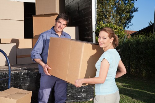 Professional van mover reviewing safe transport procedures