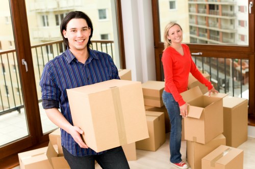 Professional movers organising fragile items in Sidcup